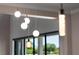 Modern pendant lights illuminate the kitchen, complementing the design and offering a touch of elegance at 4717 Emerald Palms Ct, Winter Haven, FL 33884
