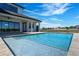 Beautiful pool with brick pavers and covered patio at 4717 Emerald Palms Ct, Winter Haven, FL 33884