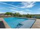 Inviting pool and spa with detailed tile trim work at 4717 Emerald Palms Ct, Winter Haven, FL 33884