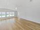 Spacious living room with wood floors and lots of natural light at 4986 Foxwood Lake Dr, Lakeland, FL 33810