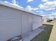 Exterior shot of the gray storage shed at 4986 Foxwood Lake Dr, Lakeland, FL 33810