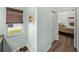 Bathroom view with window, showing natural light and view to the exterior, and adjacent bedroom at 5325 Nicklaus Dr, Winter Haven, FL 33884