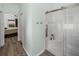Bathroom displaying tiled walk-in shower with glass door, offering a clean aesthetic at 5325 Nicklaus Dr, Winter Haven, FL 33884