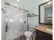 Bathroom showcases a walk-in tiled shower with glass door and modern fixtures at 5325 Nicklaus Dr, Winter Haven, FL 33884