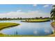 Picturesque golf course with water feature, providing a scenic and challenging experience for golfers at 5325 Nicklaus Dr, Winter Haven, FL 33884