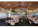 Inviting community restaurant with cozy seating, ideal for social gatherings and dining experiences at 5325 Nicklaus Dr, Winter Haven, FL 33884