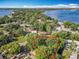 Beautiful aerial view of a wooded homesite near a lake, offering privacy and natural beauty at 5402 Parkway Drive, Belle Isle, FL 32809
