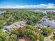 Beautiful aerial view of a wooded homesite near the water, offering privacy and lake access at 5402 Parkway Drive, Belle Isle, FL 32809