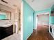 A view of the bathroom with connected living room featuring tile floors and a shower at 5402 Parkway Drive, Belle Isle, FL 32809