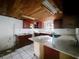 Spacious kitchen featuring granite counter tops, custom cabinets, and tile flooring at 5402 Parkway Drive, Belle Isle, FL 32809