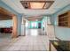 Open concept space showcasing the tile flooring and wood accents at 5402 Parkway Drive, Belle Isle, FL 32809