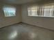 Bright bedroom with multiple windows, clean carpet and fresh paint at 5512 Meander Ln, Lake Wales, FL 33898