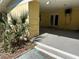 View of the carport featuring a doorway to the home and an exterior air conditioning unit at 5512 Meander Ln, Lake Wales, FL 33898