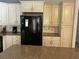 Bright kitchen with updated appliances, custom cabinets, and granite countertops at 5512 Meander Ln, Lake Wales, FL 33898