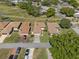 Aerial view of the property, highlighting its location in a residential neighborhood near a golf course at 602 Turnberry Ct, Winter Haven, FL 33884