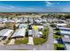 Aerial view of a well-maintained manufactured home in a beautiful community near the water at 6433 Jacaranda Ne Ave, Winter Haven, FL 33881