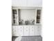 Built-in shelving and storage cabinets, perfect for displaying decor and storage at 6433 Jacaranda Ne Ave, Winter Haven, FL 33881