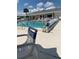 Inviting community pool with ample lounge seating for residents to enjoy the outdoors at 6515 Raintree Ne Ln, Winter Haven, FL 33881
