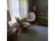 Bright living room with natural light and bamboo furniture at 6515 Raintree Ne Ln, Winter Haven, FL 33881