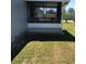 Rear patio with brick base at 6515 Raintree Ne Ln, Winter Haven, FL 33881
