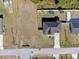 Aerial view of the property featuring a spacious lot, fenced backyard, and convenient street access at 747 Fraser Ct, Kissimmee, FL 34759