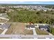 Aerial shot of a well-maintained single-Gathering home boasting a large yard with white fence at 747 Fraser Ct, Kissimmee, FL 34759