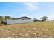 The property features a spacious, fenced backyard offering privacy and room for outdoor activities at 747 Fraser Ct, Kissimmee, FL 34759