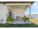 Covered patio for outdoor entertainment and relaxation in your private backyard at 747 Fraser Ct, Kissimmee, FL 34759