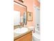 Bathroom featuring a mirror, sink, toilet, and bath tub at 908 Orista Dr, Davenport, FL 33897