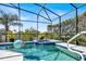 View of pool with beach ball floating in the water at 908 Orista Dr, Davenport, FL 33897