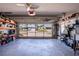 Spacious garage with ample storage space, showcasing a well-maintained interior and exterior views at 1055 Canary S Cir, Lakeland, FL 33809