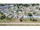 An aerial view of a residential area with well-maintained homes and landscaping, showcasing community layout at 1055 Canary S Cir, Lakeland, FL 33809
