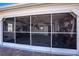 Well-organized garage with a screen, providing ample space for storage and projects at 1055 Canary S Cir, Lakeland, FL 33809