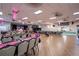 Large event space with tables decorated with pink and black decor at 1055 Canary S Cir, Lakeland, FL 33809