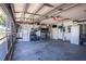 Spacious garage with ample storage space, tool storage, and an organized interior at 1055 Canary S Cir, Lakeland, FL 33809