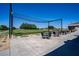 Community golf practice area with covered seating providing a relaxing outdoor experience at 1055 Canary S Cir, Lakeland, FL 33809