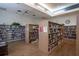 Community library featuring extensive bookshelves filled with books, creating a quiet reading space at 1055 Canary S Cir, Lakeland, FL 33809