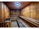 Indoor sauna with wooden benches, providing a relaxing space at 1055 Canary S Cir, Lakeland, FL 33809