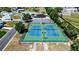 Aerial view of well-maintained tennis courts, perfect for recreational enjoyment at 1055 Canary S Cir, Lakeland, FL 33809