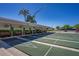 Community shuffleboard courts with shaded seating, perfect for leisurely recreation at 1055 Canary S Cir, Lakeland, FL 33809
