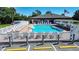 Inviting community pool area with ample seating and a relaxing atmosphere at 1055 Canary S Cir, Lakeland, FL 33809