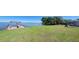 Large backyard with view of the lake and a private dock at 121 Bonnie Dr, Auburndale, FL 33823