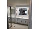 Bright bathroom featuring double sinks, large mirrors, and ample counter space, combining functionality with style at 121 Bonnie Dr, Auburndale, FL 33823