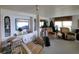 Spacious living room featuring built-in cabinets, comfortable furniture, and a bright interior at 121 Bonnie Dr, Auburndale, FL 33823