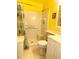 Bathroom featuring a shower, toilet, and vanity, all in neutral colors at 1219 Club Cir, Lakeshore, FL 33854