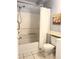 Clean bathroom featuring a shower-tub combo, toilet, and vanity area at 1219 Club Cir, Lakeshore, FL 33854