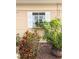 Window box view of house with shrubbery at 1219 Club Cir, Lakeshore, FL 33854