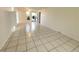 Spacious living room features a tiled floor and neutral wall paint at 1219 Club Cir, Lakeshore, FL 33854