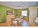 Dining room featuring a glass table with seating for six and a decorative cabinet at 122 Wgto Tower Rd, Lake Alfred, FL 33850