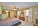 View of main bedroom with view to the en-suite bathroom and lots of natural light at 122 Wgto Tower Rd, Lake Alfred, FL 33850